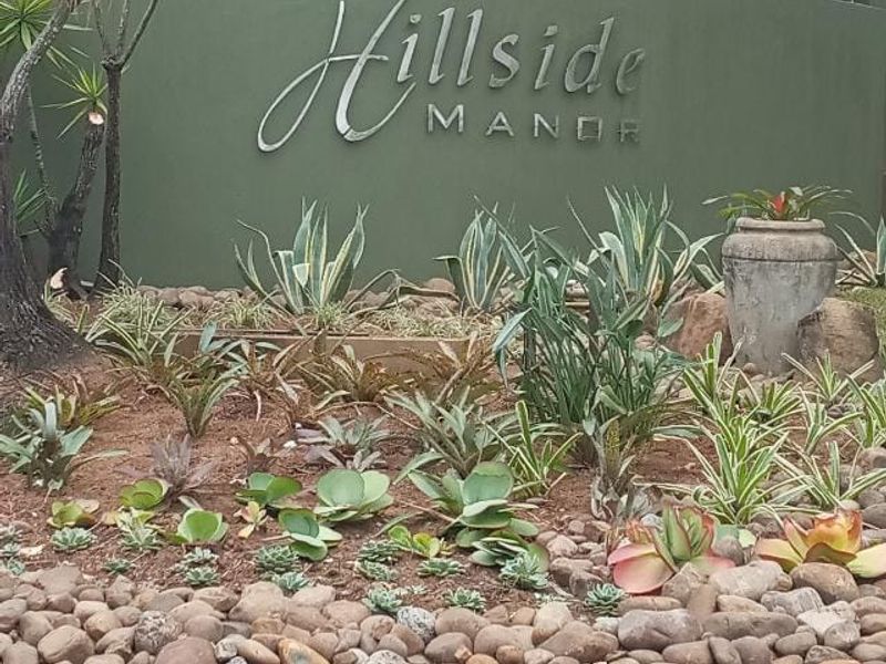 Spacious three bedroom for sale in Hillside Manor - Photo 1