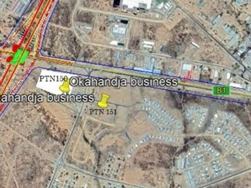Aerial satellite view showing vacant commercial land plots PTN 150 and PTN 151 located near the B1 highway in Okahandja.