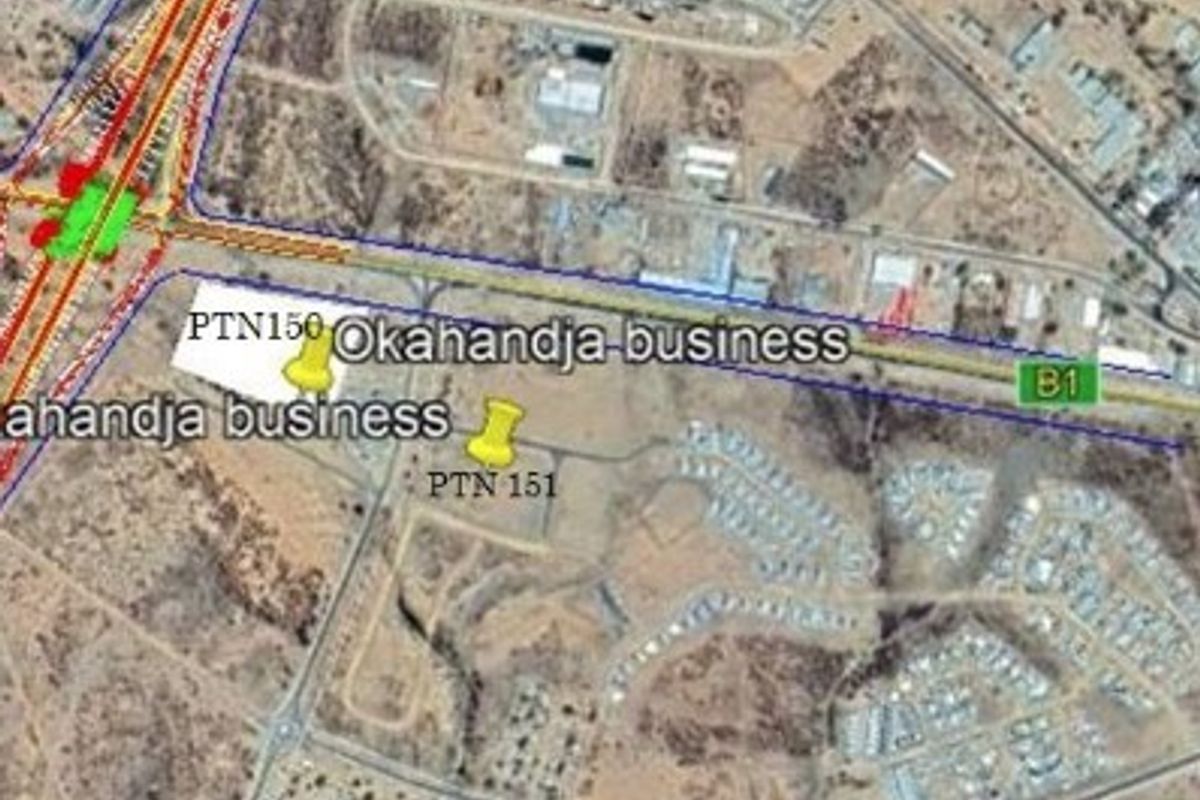 Aerial satellite view showing vacant commercial land plots PTN 150 and PTN 151 located near the B1 highway in Okahandja.