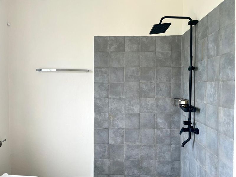 An Exceptional Villa with Outstanding Potential, Blending Contemporary Elegance and Tropical Living - Photo 7