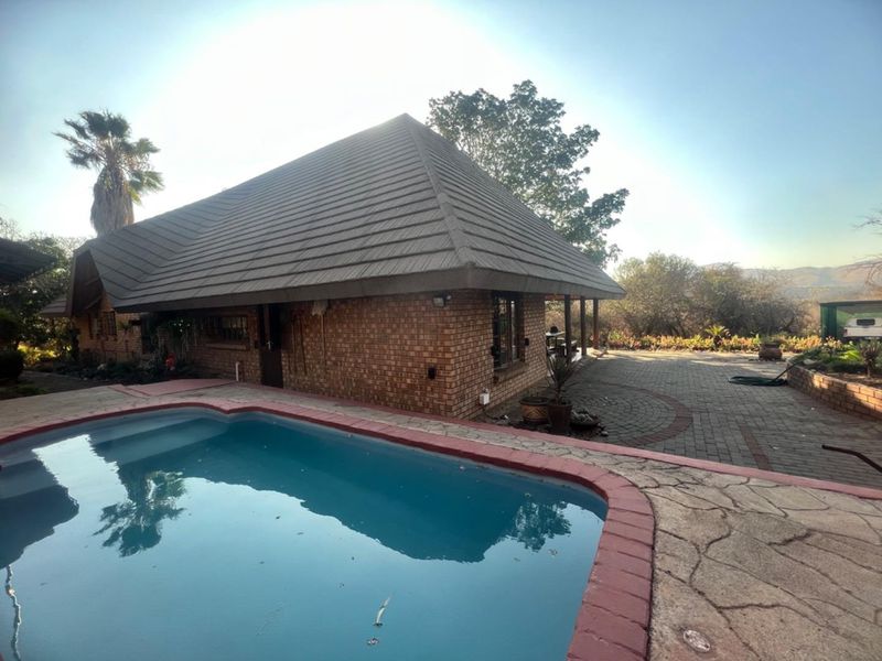 Expansive Property with Main House & Income-Generating Second Property - Photo 2