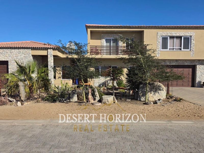 Erongo , Rossmund | Charming Double-Storey Home with Modern Amenities and Scenic Surroundings - Photo 3