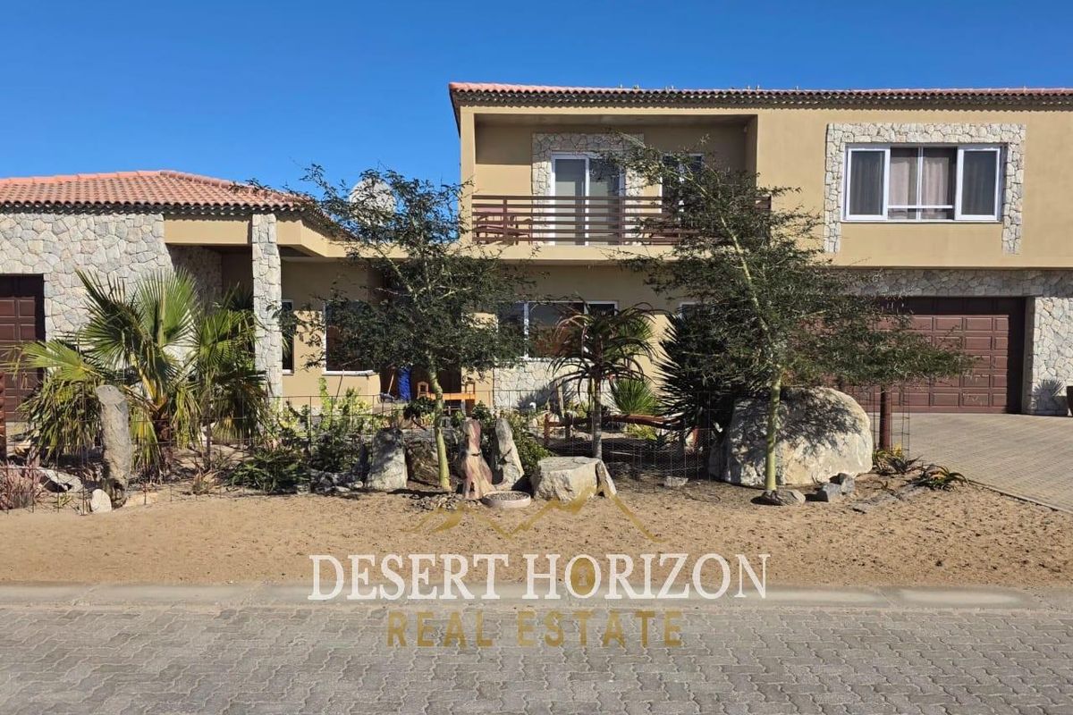 Erongo , Rossmund | Charming Double-Storey Home with Modern Amenities and Scenic Surroundings - Photo 3