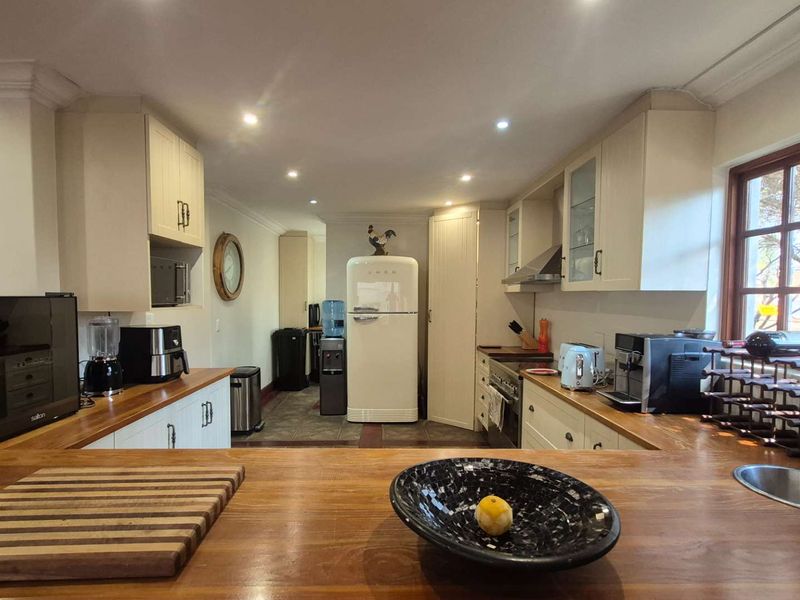 A Country-Style Family Haven with Separate Cottage in the Heart of Douglasdale - Photo 5