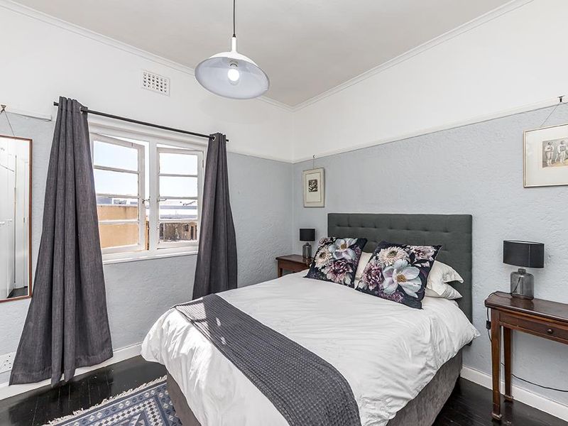 Art Deco Corner Apartment That Feels Like 'Home' - Photo 6