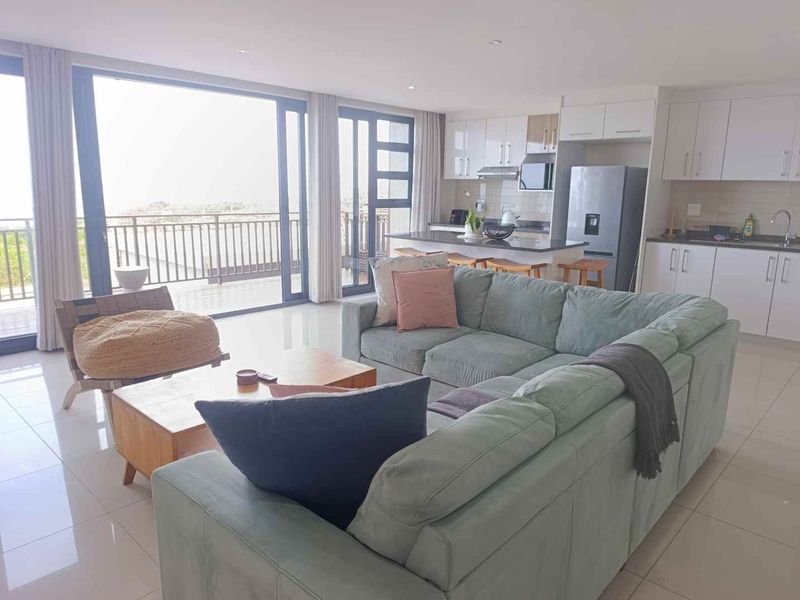 BEACHFRONT BLISS | FULLY FURNISHED 2-BEDROOM APARTMENT FOR RENT - Photo 1