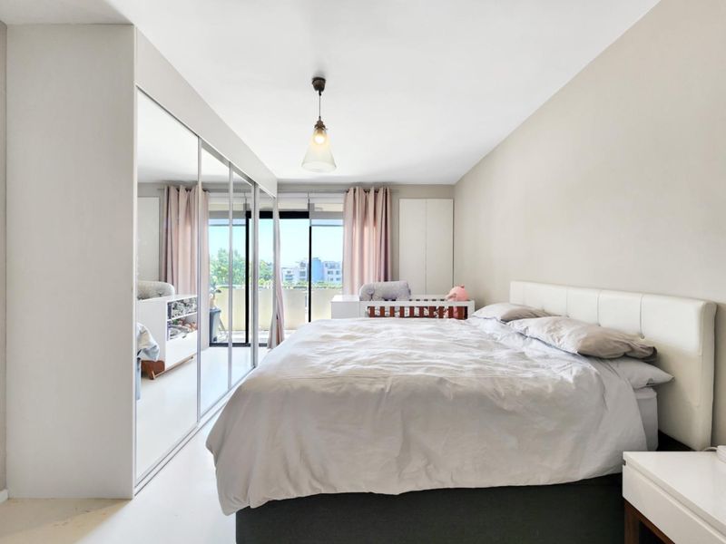 Sun Kissed Two Bedroom Apartment with Balcony and Garage - Photo 4