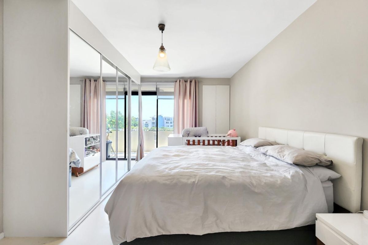 Sun Kissed Two Bedroom Apartment with Balcony and Garage - Photo 4