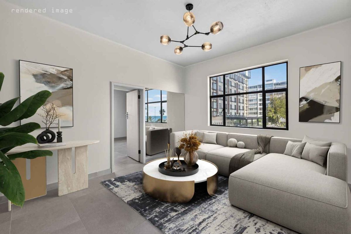 A bright and modern living room featuring large windows, contemporary lighting, and neutral tiled flooring with a view of the surrounding urban area.