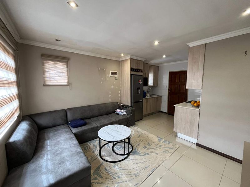 Modern 2 Bedroom Home in Secure Windmill Park Estate - Photo 3