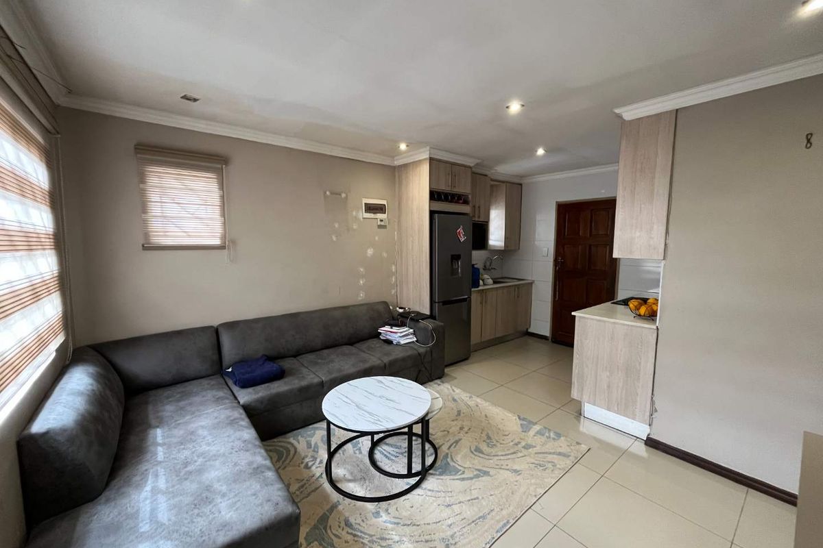 Modern 2 Bedroom Home in Secure Windmill Park Estate - Photo 3