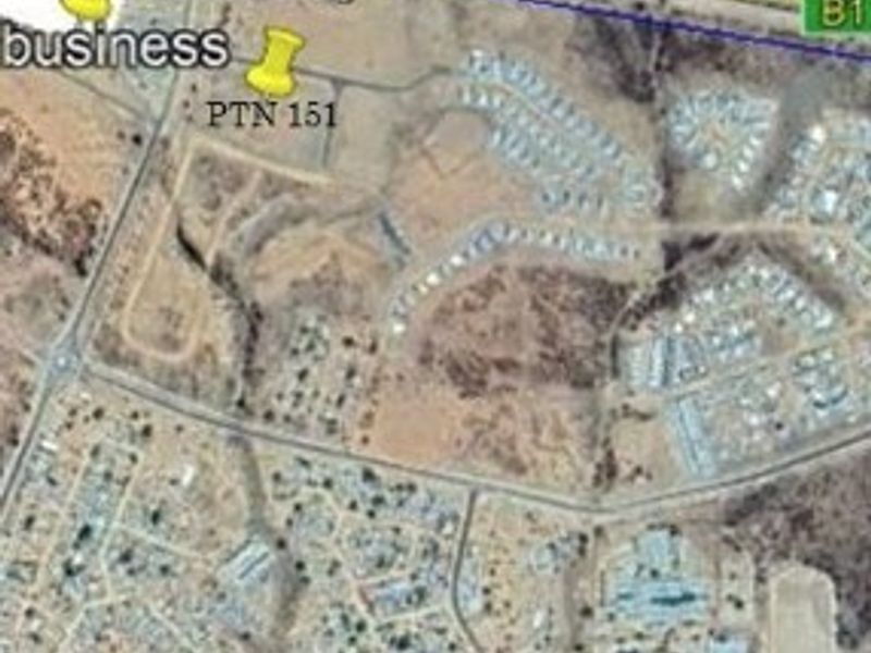 An aerial satellite view showing the layout of the commercial land parcels and surrounding road infrastructure in Okahandja.