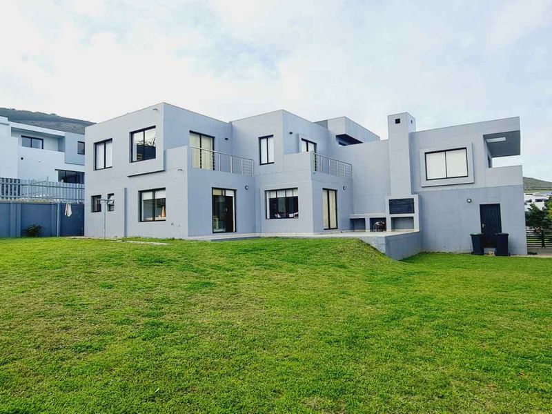 Elegant Family Living with Spectacular De Grendel Wine Farm Views - Photo 3