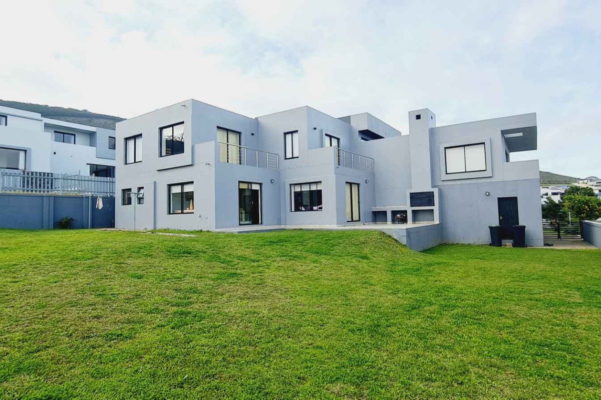 Elegant Family Living with Spectacular De Grendel Wine Farm Views - Photo 3