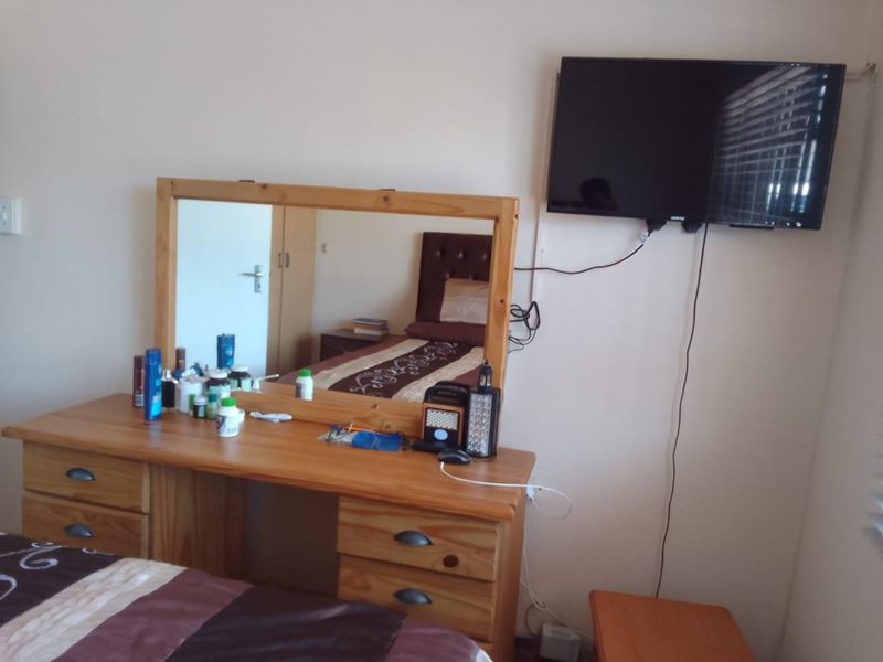 Cozy 3-Bedroom Home with Carport, Satellite Dish, and Comfortable Living Spaces - Photo 7