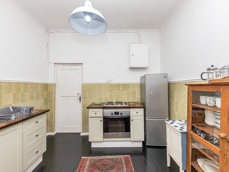 Art Deco Corner Apartment That Feels Like 'Home' - Photo 8