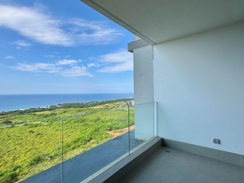 This brand-new, never-before-lived-in apartment offers a refined coastal lifestyle with breathtaking panoramic sea views and sleek, modern finishes throughout - Photo 2