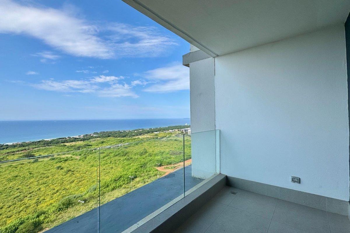 This brand-new, never-before-lived-in apartment offers a refined coastal lifestyle with breathtaking panoramic sea views and sleek, modern finishes throughout - Photo 2