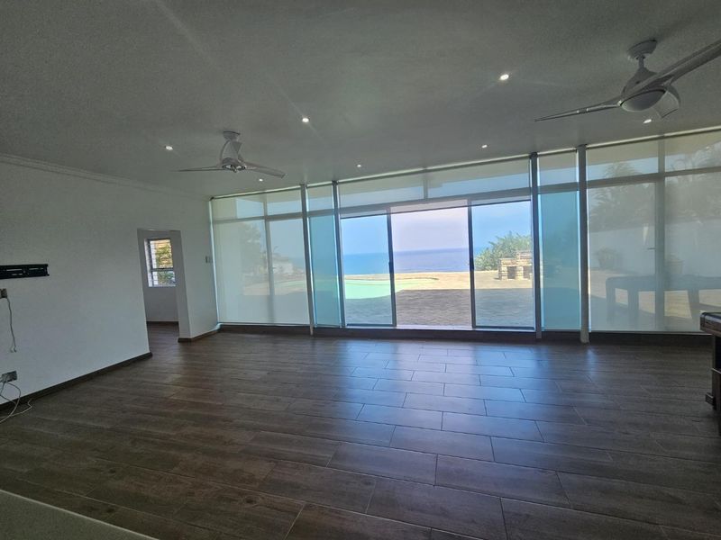 Sun-Soaked Modern Home with 5 Bedrooms &amp; Jaw-Dropping Sea Views - Photo 3