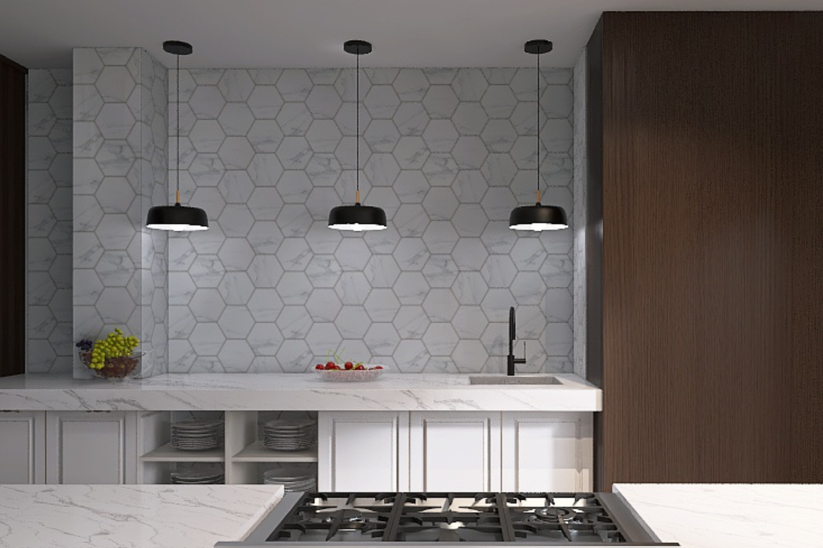 Modern kitchen featuring marble-look countertops, hexagonal tile backsplash, integrated sink, and built-in gas cooktop with contemporary pendant lighting.