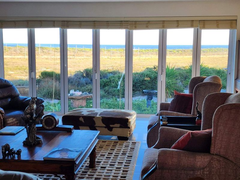 Modern Spacious Living at the Beach with Sea Views - Photo 9