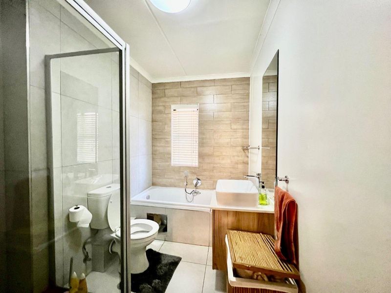 Charming 3-Bed Garden Unit in Sought-After Modderfontein Estate - Photo 9