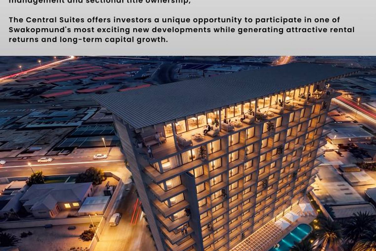 An aerial perspective of The Central Suites, a modern high-rise development featuring balconies, a pool area, and contemporary architectural design in Swakopmund.