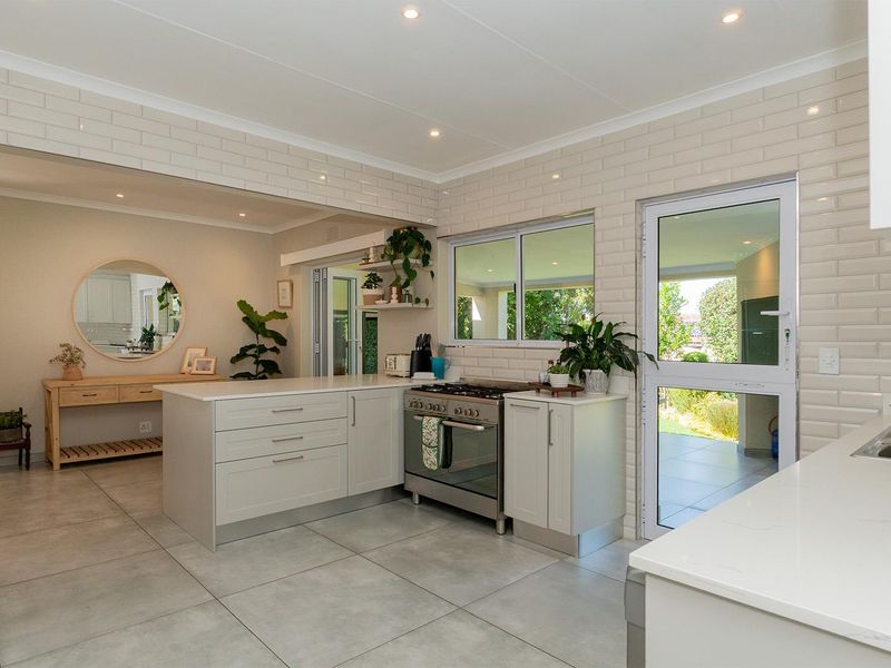 Stylish 4-Bedroom off-grid Family Home in Secure Van Riebeeck Park Enclosure - Photo 9