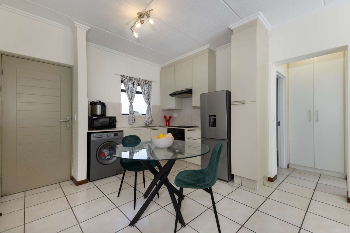 A WELL- POSITIONED MIDDLE FLOOR UNIT IN SOUGHT AFTER TEQUILA SUNRISE - Photo 4