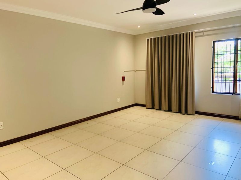 Luxurious 5-Bedroom Home in Exclusive 4-Unit Complex - Photo 8