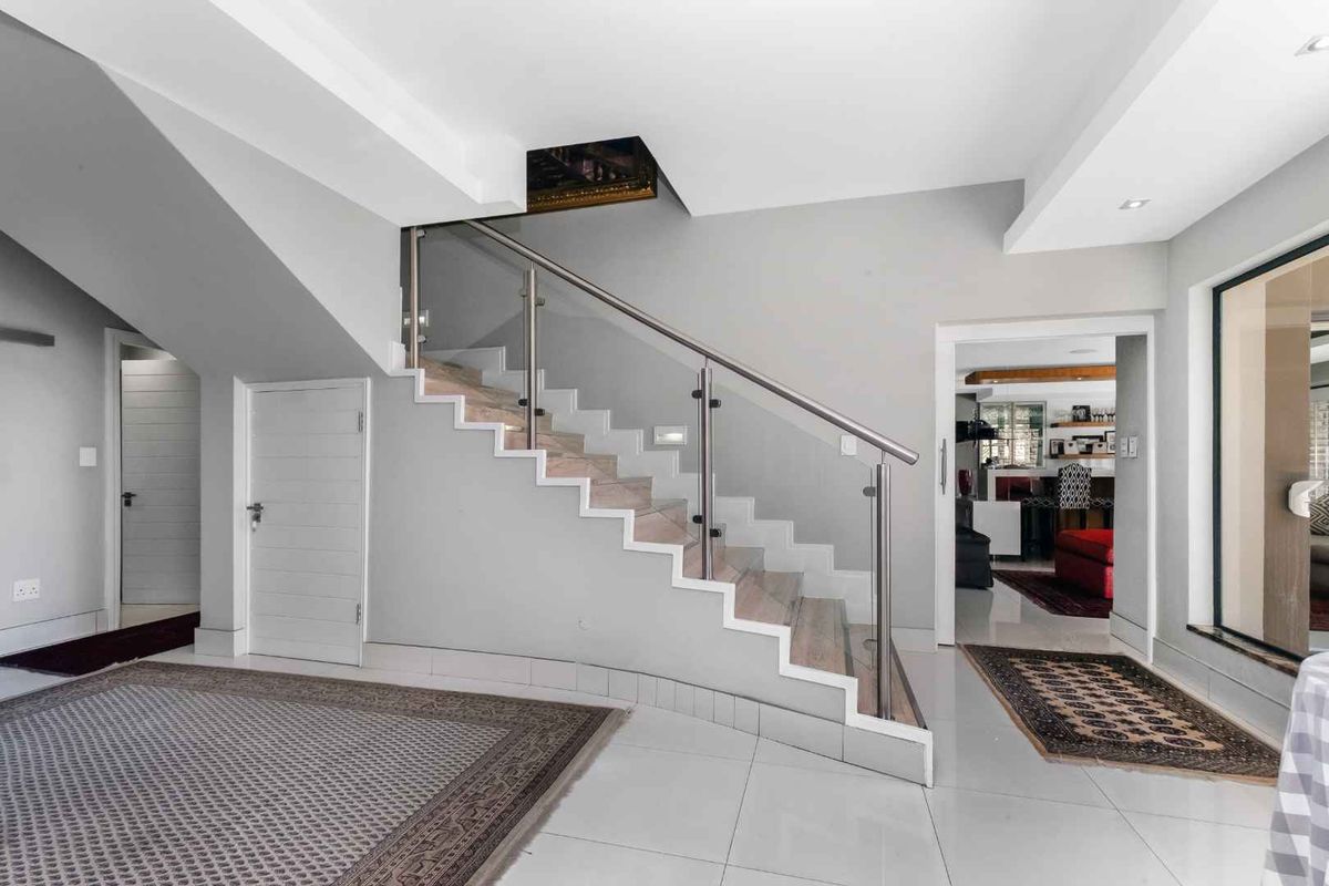 A PRIZED PROPERTY READY FOR ITS NEXT OWNERS BOASTS A FLEXIBLE LAYOUT AND IS TASTEFULLY DESIGNED WITH CAPTIVATING DETAIL - Photo 5