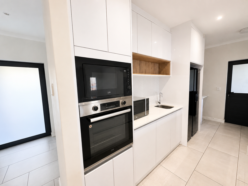 Stylish 4-Bedroom Double-Storey Family Home in the Heart of Sandown, Cape Town - Photo 7