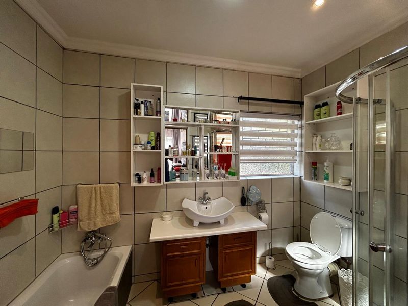 Spacious 5-Bed Home with Pool, Braai, and Top Security Features - Photo 6