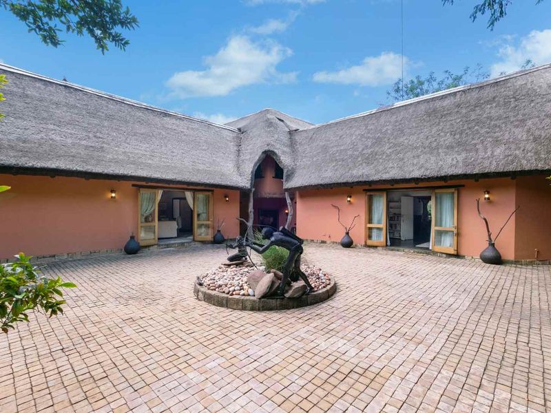 AN EXQUISITE, BUSH LODGE-THEMED, FAMILY SANCTUARY OFFERING TIMELESS ELEGANCE AND UNMATCHED TRANQUILITY IN A SERENE INDIGENOUS GARDEN SETTING - Photo 5