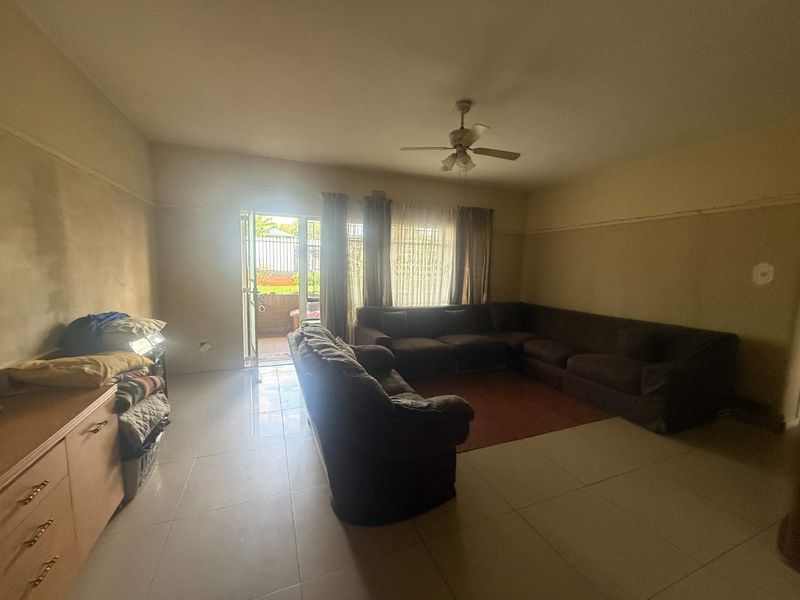 Ground Floor Comfort with Space and Security - Photo 4