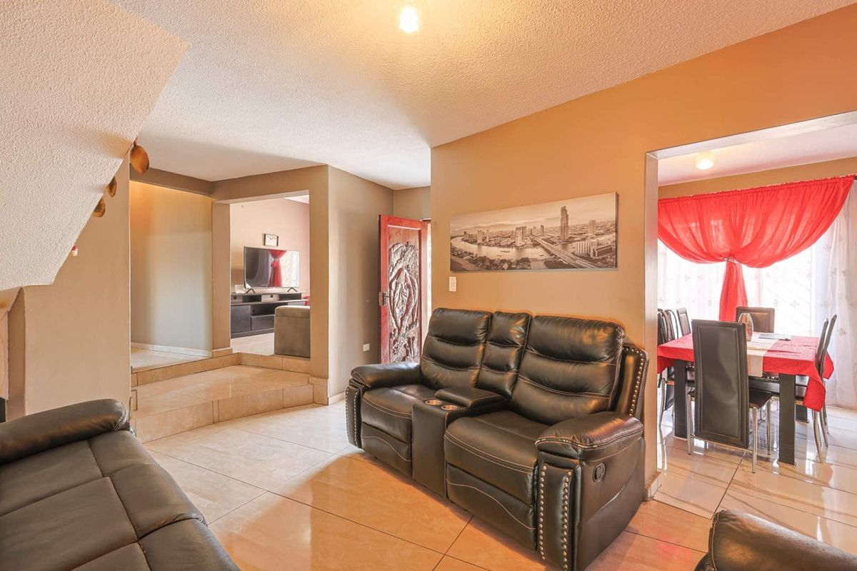Spacious 3 Bedroom Family Home with Income-Generating Flatlets - Photo 4