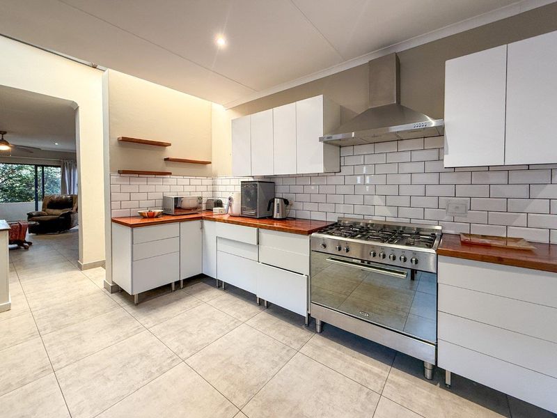 Serenity. Style. Security | Contemporary family living in leafy Constantia Glen Security Village - Photo 9