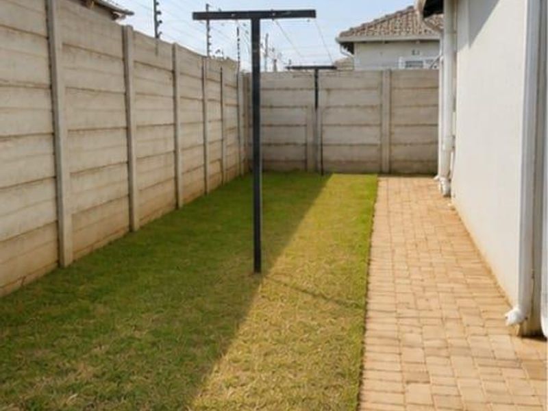 Safe & Spacious 3-Bedroom Home with Yard – Move-In Ready in "GREENWOOD GARDENS" Estate Alliance - Photo 6