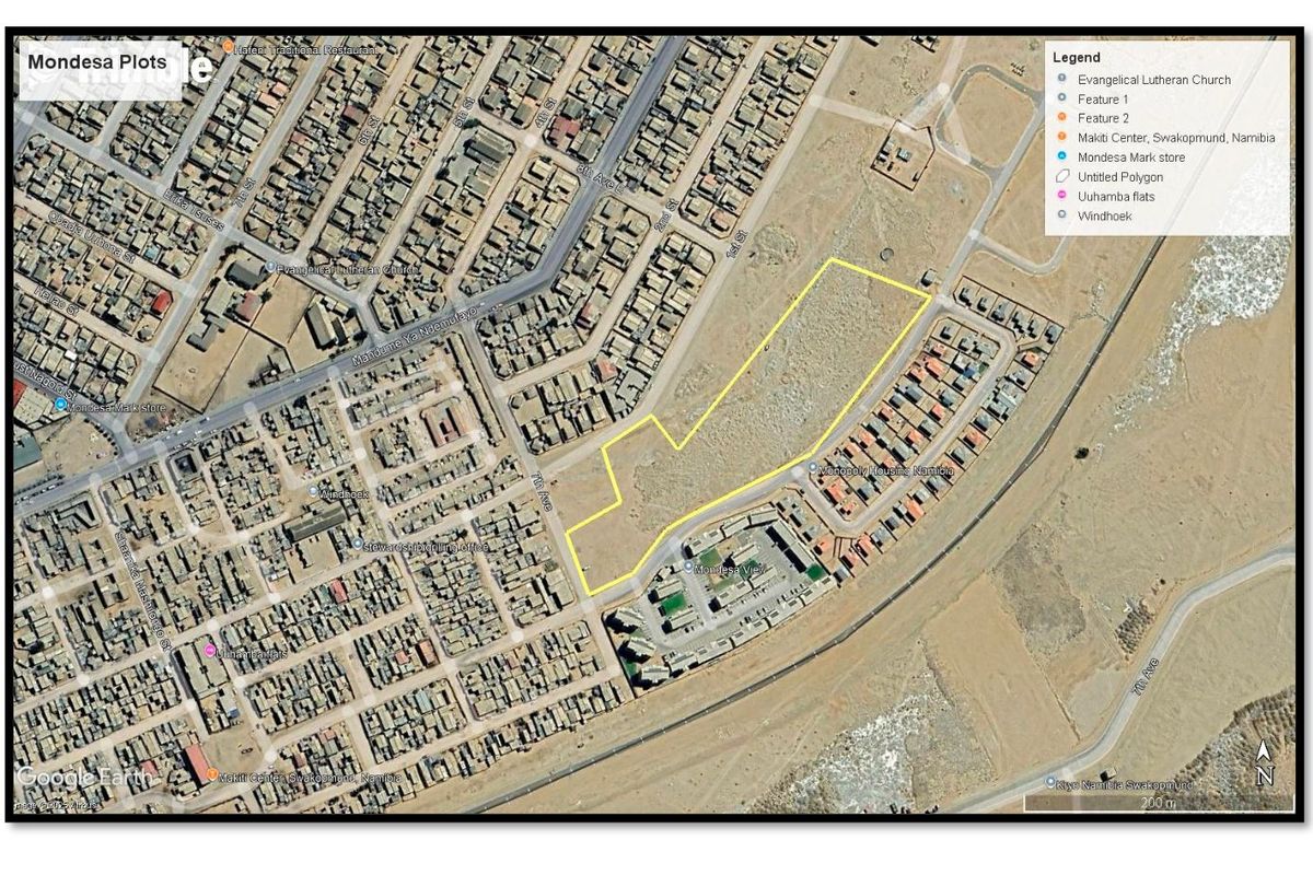 An aerial satellite view of a vacant land plot in Mondesa, Swakopmund, highlighted with a yellow boundary line.