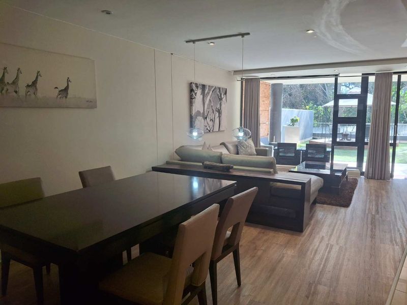 A BEAUTIFULLY FURNISHED TWO BEDROOM GARDEN APARTMENT - Photo 8