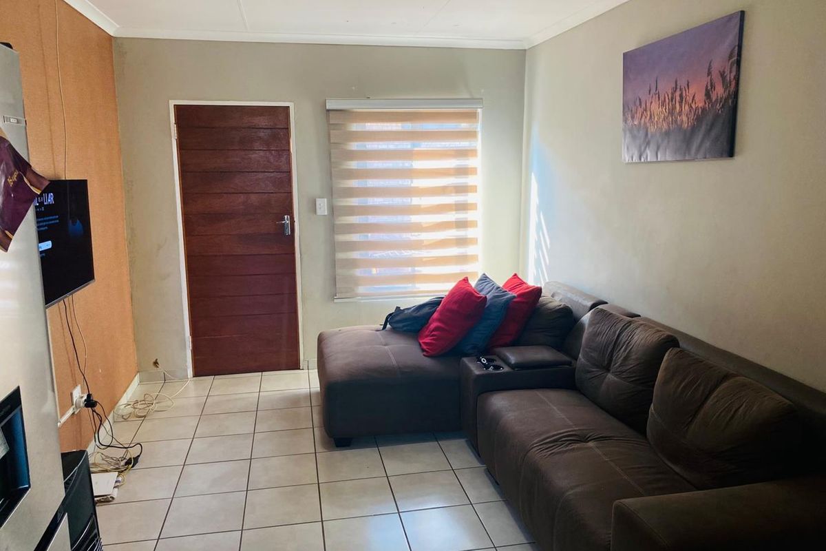 Discover Affordable, Secure and Comfortable living in Elandspoort!!! - Photo 3