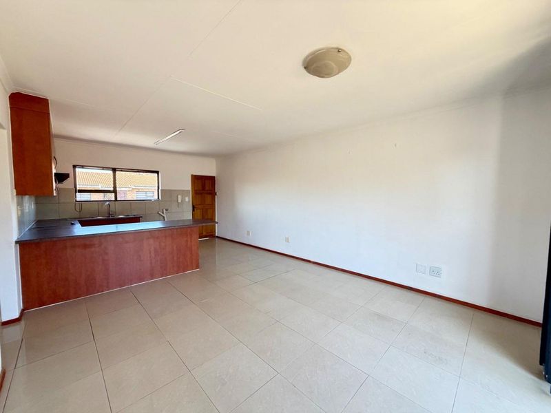 First Floor Low Maintenance Facebrick Unit in Well Managed Complex - Photo 2