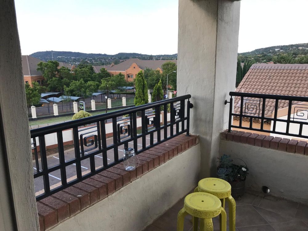 covered patio with open view over valley
