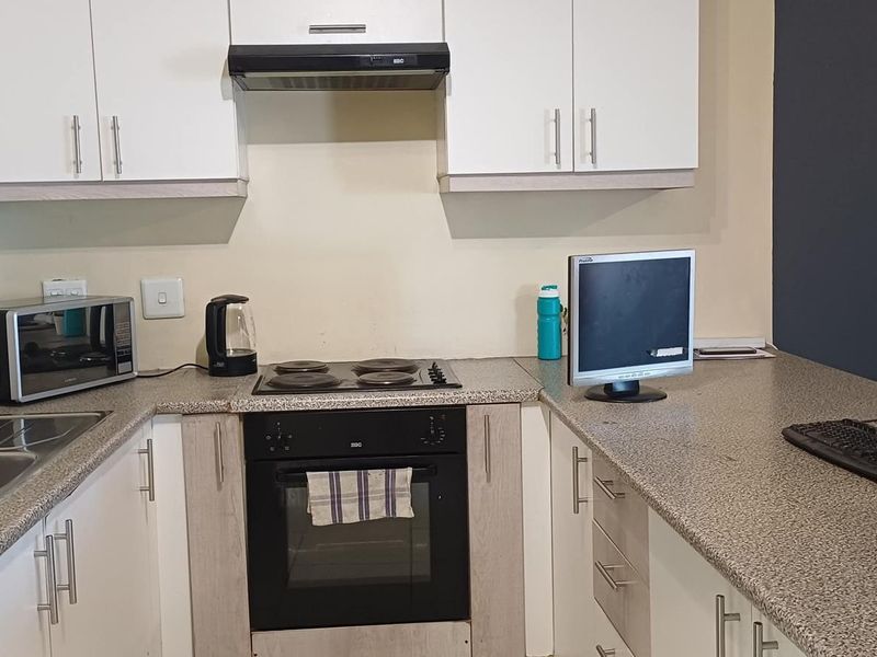 This affordable apartment in Extension 6 is ideal for single professionals, young couples, and first-time buyers wanting a safe and cozy place to call home! 🏡 - Photo 4
