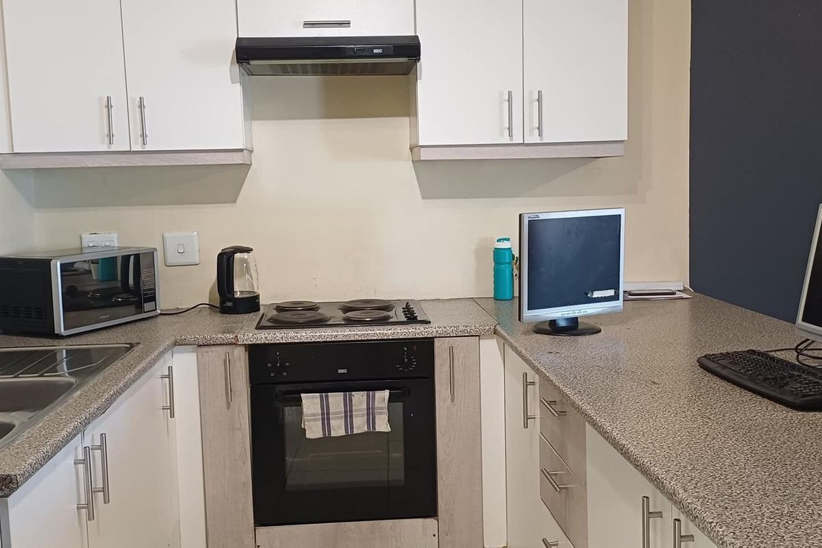 This affordable apartment in Extension 6 is ideal for single professionals, young couples, and first-time buyers wanting a safe and cozy place to call home! 🏡 - Photo 4