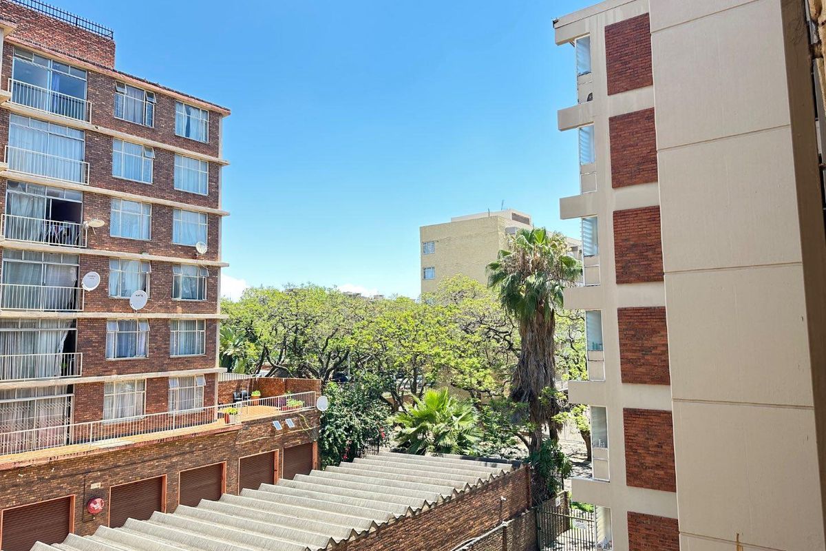 Charming 1-BR in Sunnyside: Secure, Central, Convenient! - Photo 2