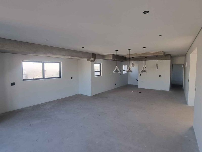 SUNBIRD 8A – Flexible Coastal Living with Exceptional Design - Photo 4