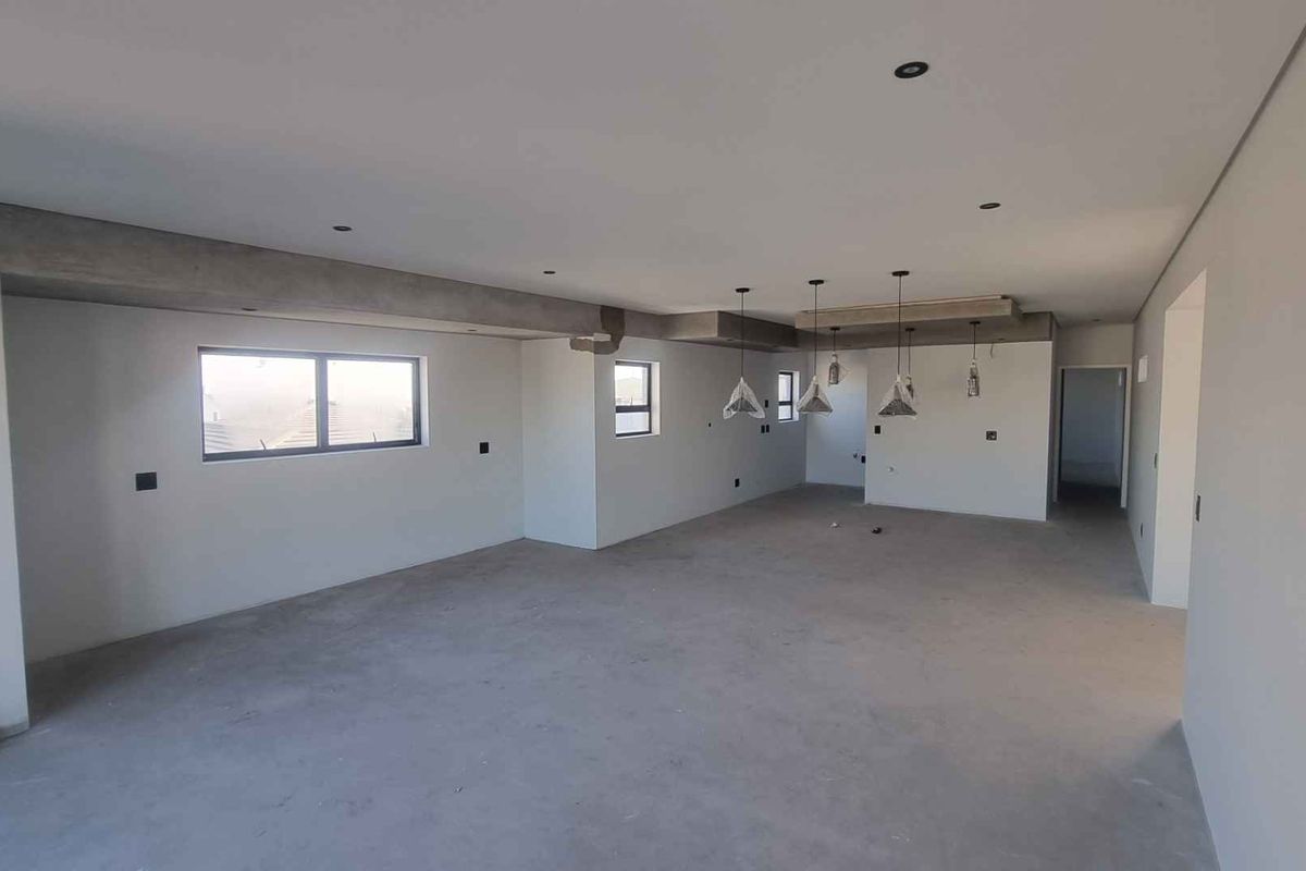 SUNBIRD 8A – Flexible Coastal Living with Exceptional Design - Photo 4