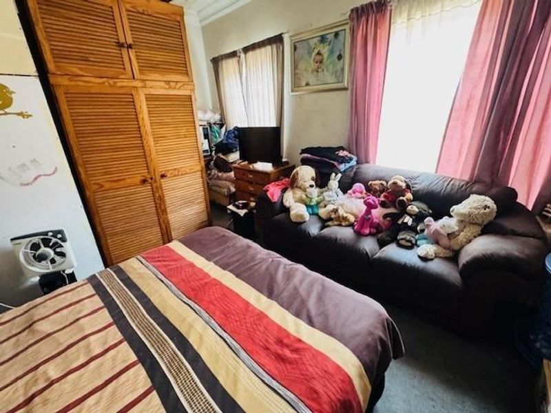 High-Yield Living: A Solid Forest Hill Home With Dual Income Streams - Photo 8