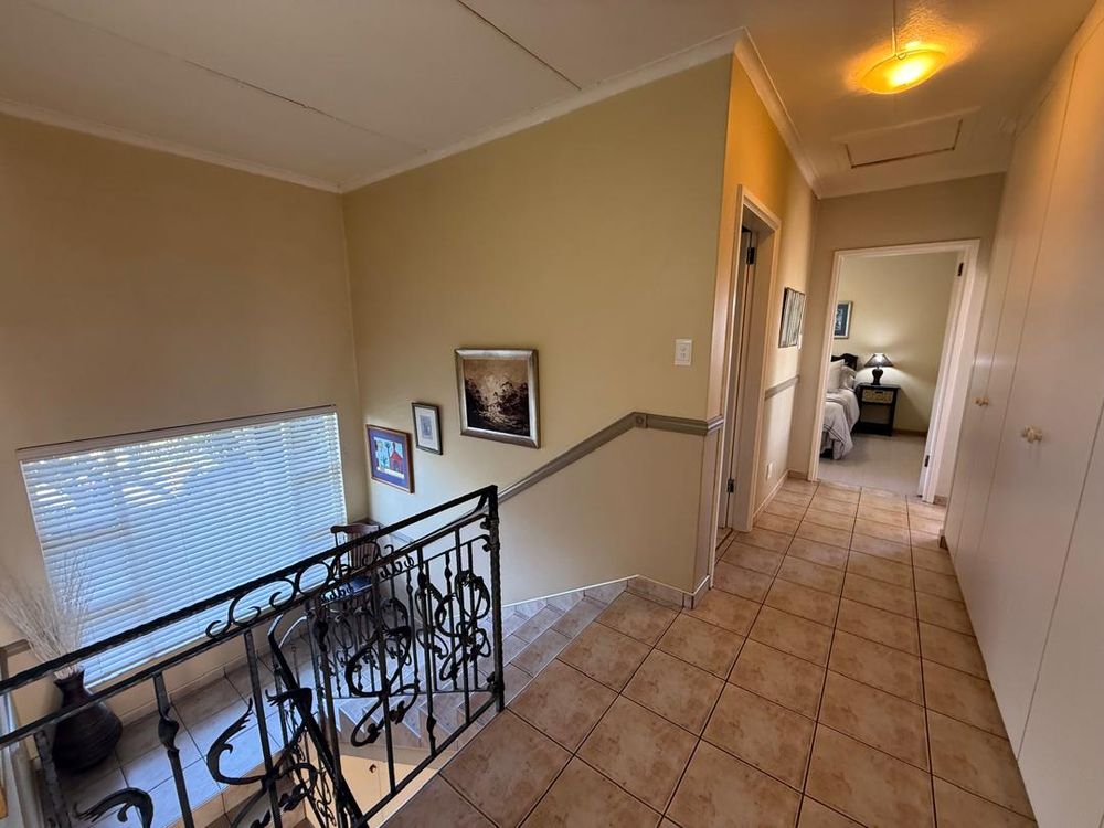First floor hallway leading to the bedrooms